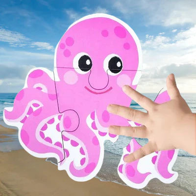 puzzle montessori pieuvre rose main enfant